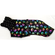 "The outer layer is Minky - a warm, incredibly soft yet durable fabric that's just like wearing a hug. It is amazingly soft, plush, and drapes beautifully. Colors are far sharper and more vivid than fleece fabric. The inner shell is Polartec™ 300 weight fleece. Polartec™ is the same warm, premium weight fleece found in human winter wear. The coat is generous, covering the hindquarters for warmth. A breast piece comes through the front legs and protects the entire chest area - great if your dog is curled up in a crate waiting for you. The collar is also soft Minky that drapes beautifully into ripples down the neck or folds back for a traditional collar. Two sizes are available - Medium and Large. The medium fits most whippets up to 32 pounds. The larger coat is for the males, or a girl with a longer body. It fits whippets up to 40 pounds. And a big bonus is that Minky is easy to care for - wash in warm or cold water and dry in a medium dryer."