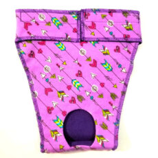 "The outer fabric is either cotton or flannel. The fabric next to your girl is flannel for comfort and absorbency. Each pair is carefully constructed with two additional layers of absorbent flannel under the tail plus a final section of waterproof diaper fabric to minimize leaks. These panties can be used with or without a pad. These panties fit a whippet from 27 pounds with a waist of 14 inches to a bitch of 36 pounds and 17 inches. The Velcro around the waist allows you to adjust for a snug, secure, yet comfortable fit. Although I recommend you use a pad, these pants have two extra layers of absorbent flannel and a waterproof diaper liner for the area just below the tail, measuring 3 inches by 2 inches. If the pad shifts during wearing, this area will catch spills. It’s great to have several on hand so she can be wearing a pair when others are being cycled through the wash. Machine wash and dry. All fabric has been pre-washed and dried in a hot dryer so you won't experience any shrinkage."